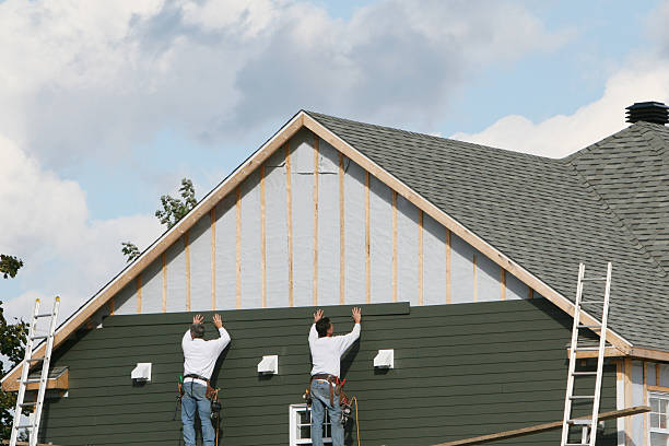 Professional Siding Contractor technician working in Miller Place, NY